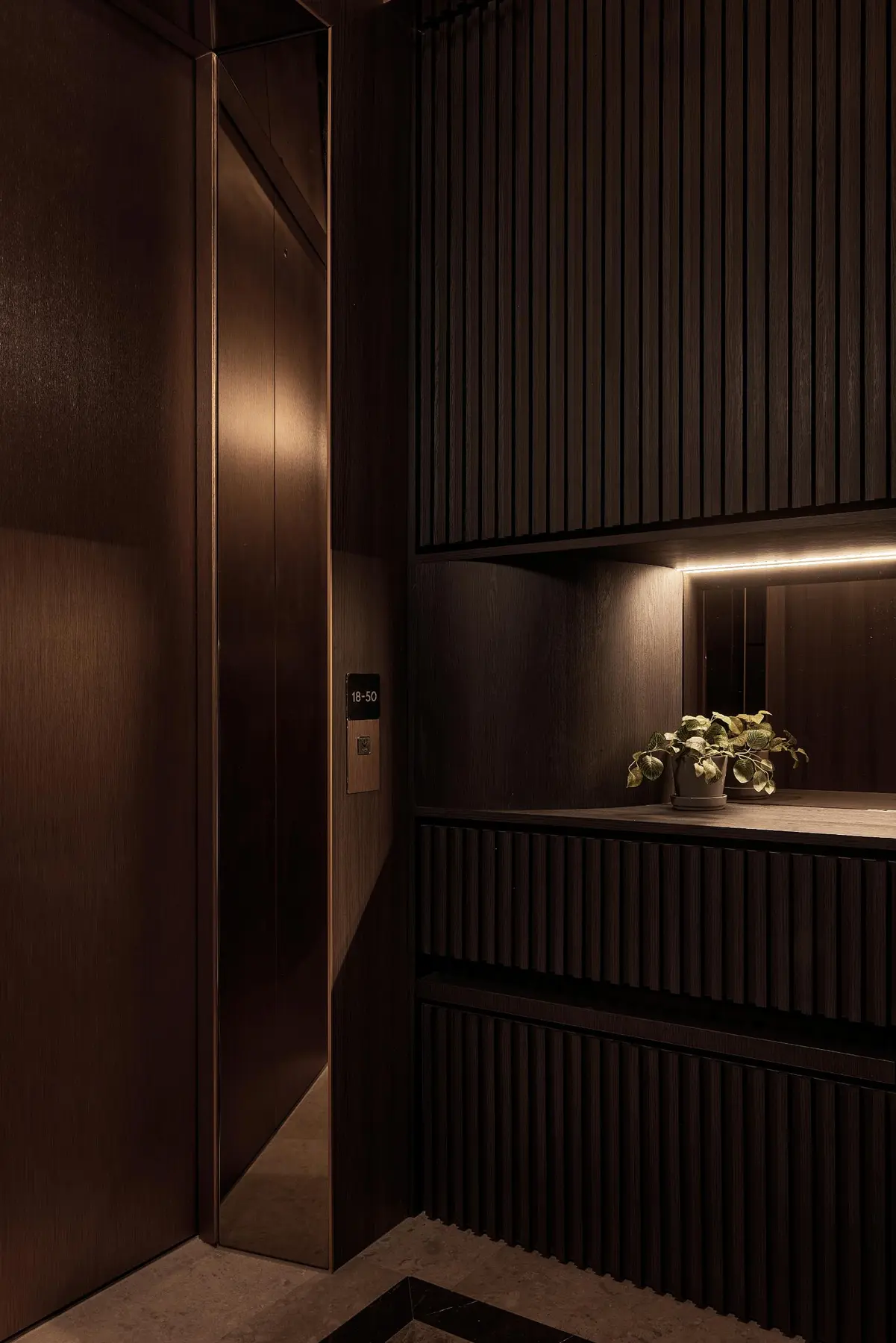 Space Change Florence Residence — fluted panel detail in evening light