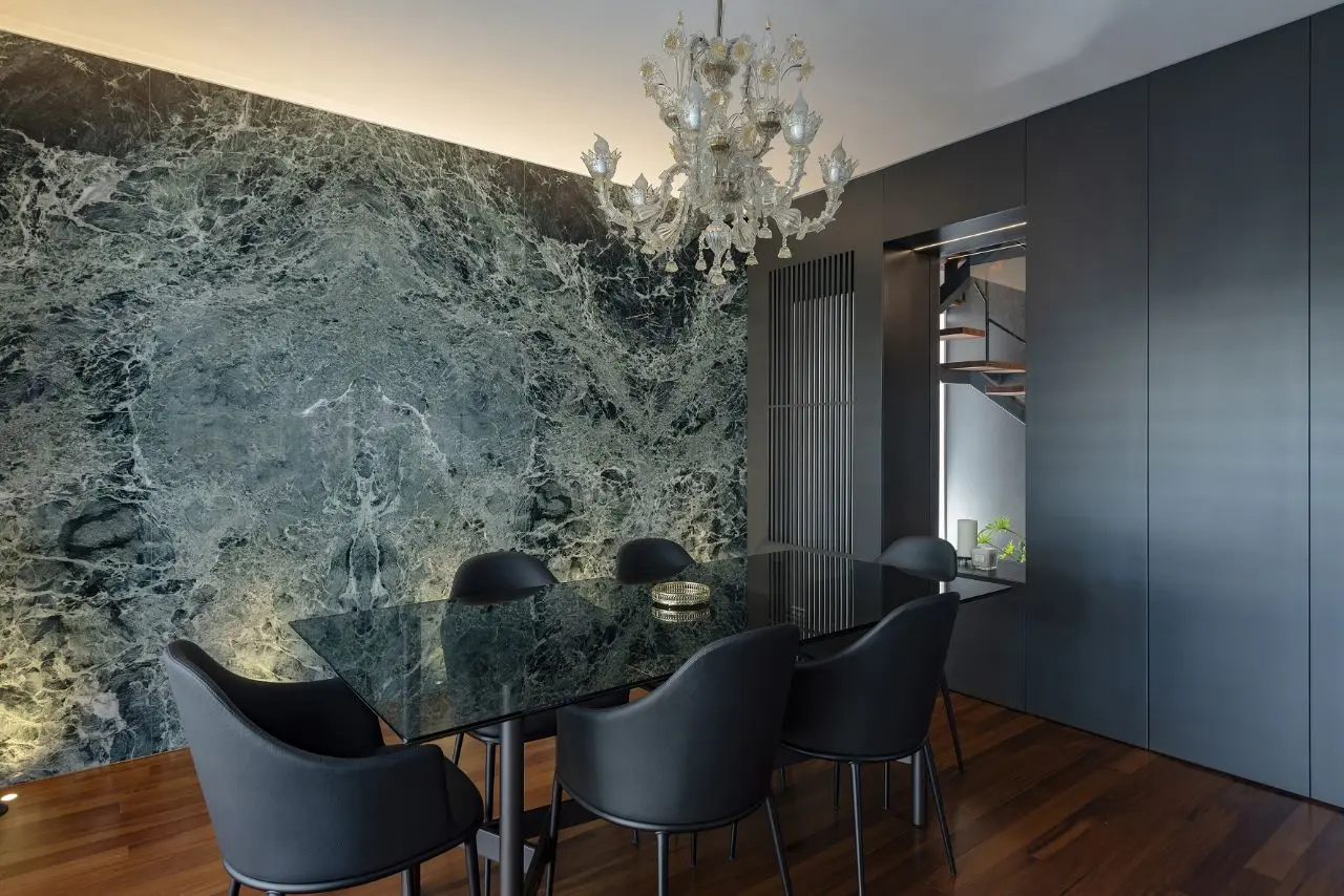 House of Sabrina — dining room with custom table and pendant lighting